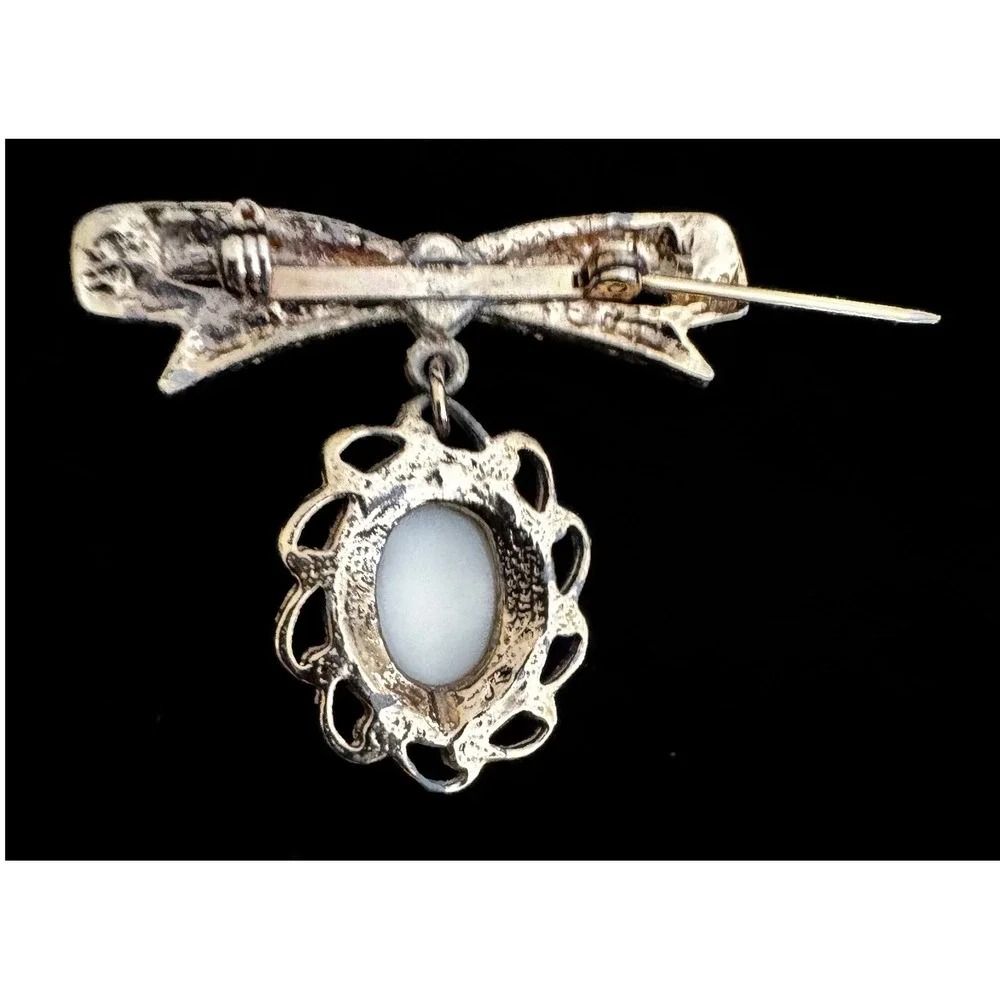 Vintage Gold Tone Bow Brooch White Oval Cabochon Dangle Scalloped Filigree Pin